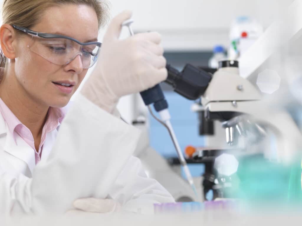 DNA Research, Scientist pipetting a DNA sample